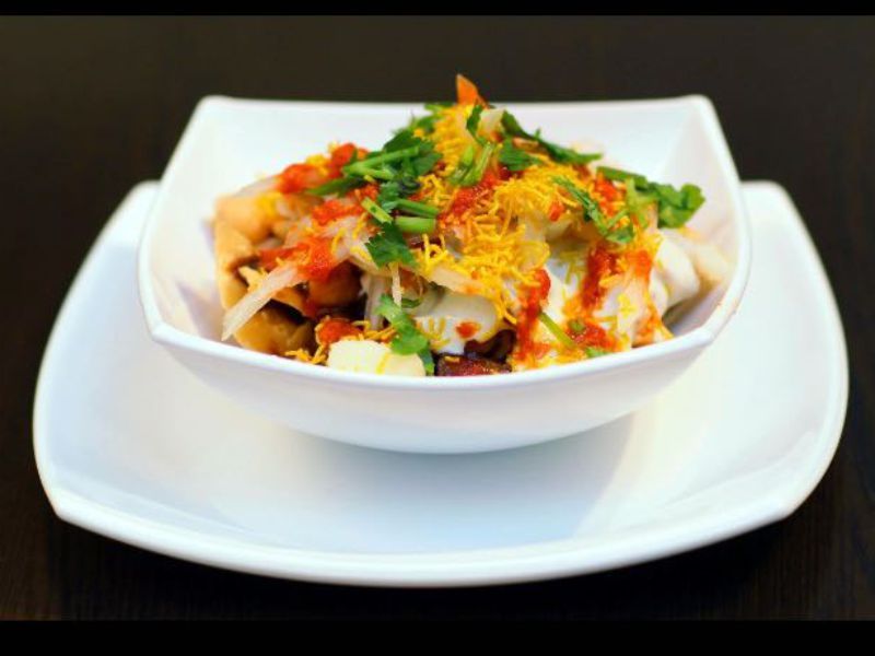 Chaat topped with sev and fresh coriander